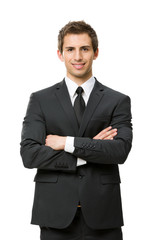 Half-length portrait of businessman with crossed hands