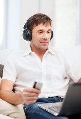 man with headphones listening to music
