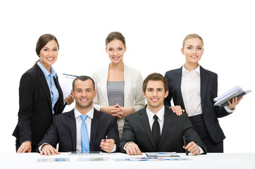Group of managers debating while sitting at the table