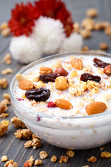 Healthy muesli breakfast with nuts and raisin