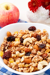 Healthy muesli breakfast with nuts and raisin