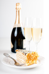 champagne in glasses and a dessert