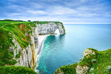 Etretat, Manneporte natural rock arch and its beach. Normandy, F