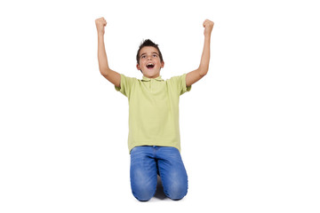 child celebrating with arms raised