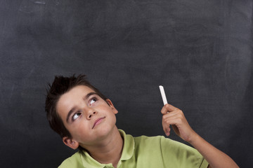 boy thinking on the board