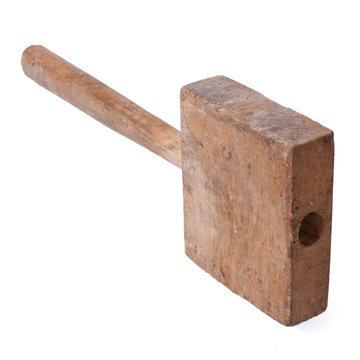 old homemade wooden hammer isolated on white background