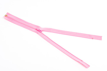 detail of pink zipper on the white background