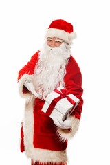 Santa Claus presenting gift box isolated on white background