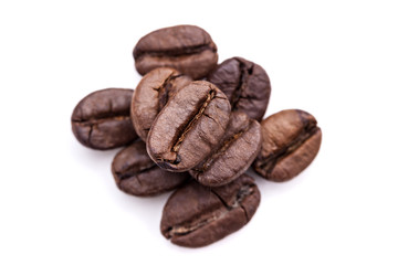 Heap of coffee beans isolated on white background