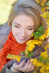 Naklejka premium close up portrait of dreaming girl in autumn park