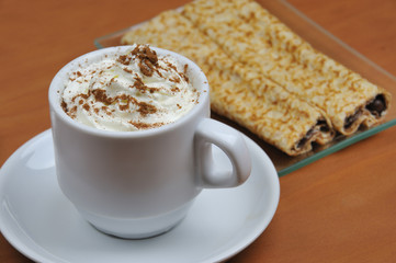 Viennese coffee with crepes or pancakes