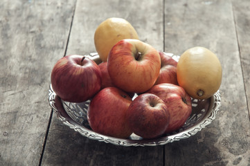 Fresh organic apples and lemons