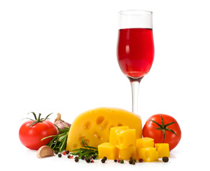 glass of red wine , cheese , tomatoes , garlic and spices