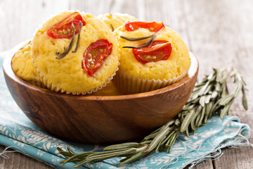 Savory muffins with corn flour, tomatoes and rosemary