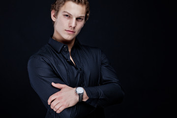 portrait of sexy macho man over dark background