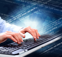 Hands with a computer keyboard.