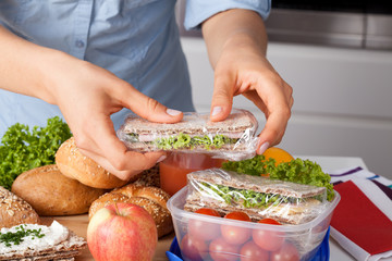 Woman preparing takeaway meal