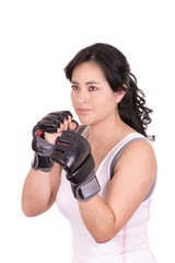 hispanic aggressive woman with boxing gloves