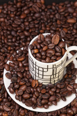 Cup and coffee beans