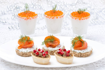 holiday appetizers - canape with salmon, tartlet with liver pate