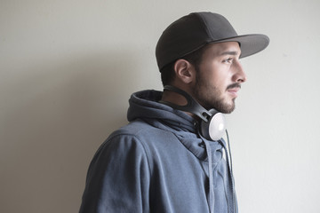 young stylish man listening to music