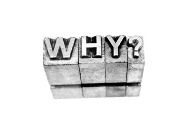 why? sign written in metallic letters on white background