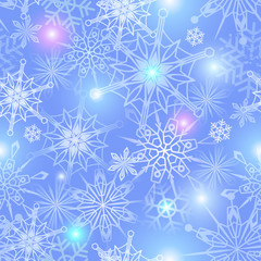 Seamless vector pattern with snowflakes and sparkles