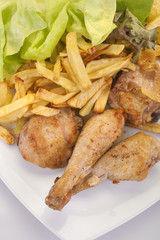 fresh roasted chicken with french fries and lettuce