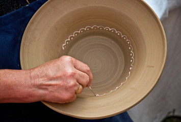 Potter working at his workshop