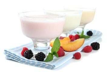 Delicious yogurt with fruit and  berries isolated on white