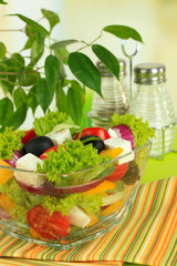 Greek salad on plate on table close-up