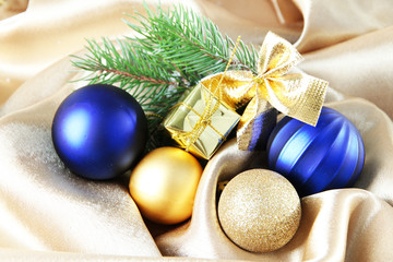 Beautiful Christmas decor on golden satin cloth