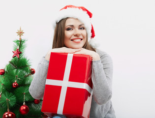 Christmas Santa hat isolated woman portrait hold christmas gift.