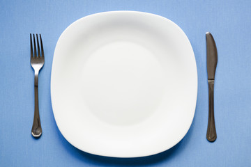 empty plate on blue