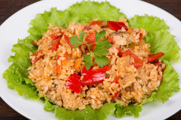 Rice with vegetables and chicken in a curry sauce
