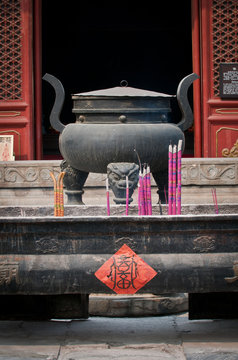 burning incenses in Dongyue Temple, Chaoyang District in Beijing