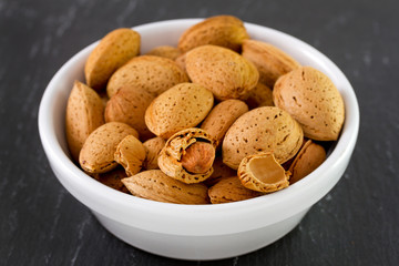 almonds on white bowl