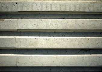 Background texture from light rough concrete bands