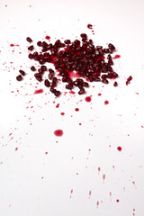 Red pomegranate fruit seeds and juice