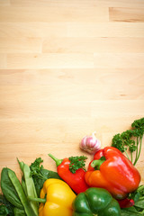 healthy organic vegetables on a wood background