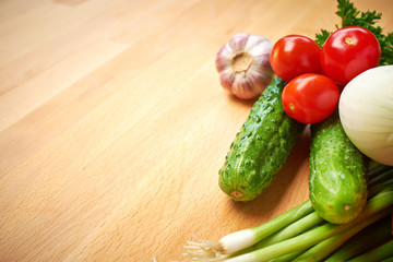 healthy organic vegetables on a wood background