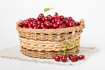 Sweet juicy cherry in basket