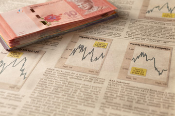 Newspaper stock market with money