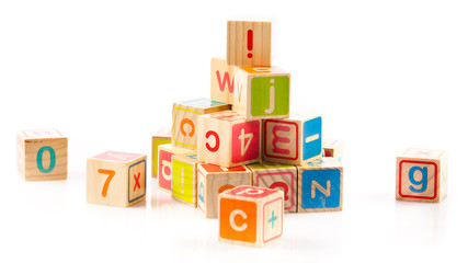 wooden toy cubes with letters. Wooden alphabet blocks.