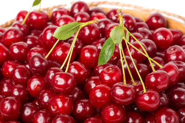 Sweet juicy cherry in basket