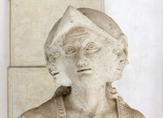 Close-up on a Statue's Three-Faced Head