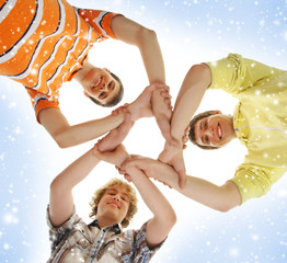 Group of smiling happy teenagers isolated on white