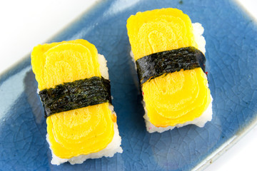 Tamago yaki is sushi using an egg , japanese food