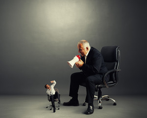 big boss screaming at small worker