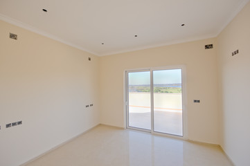 Empty, newly painted, room.